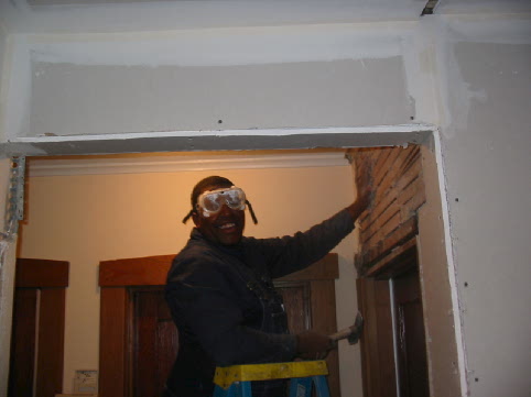 Ben removing MORE lathe and plaster to get drywall aligned